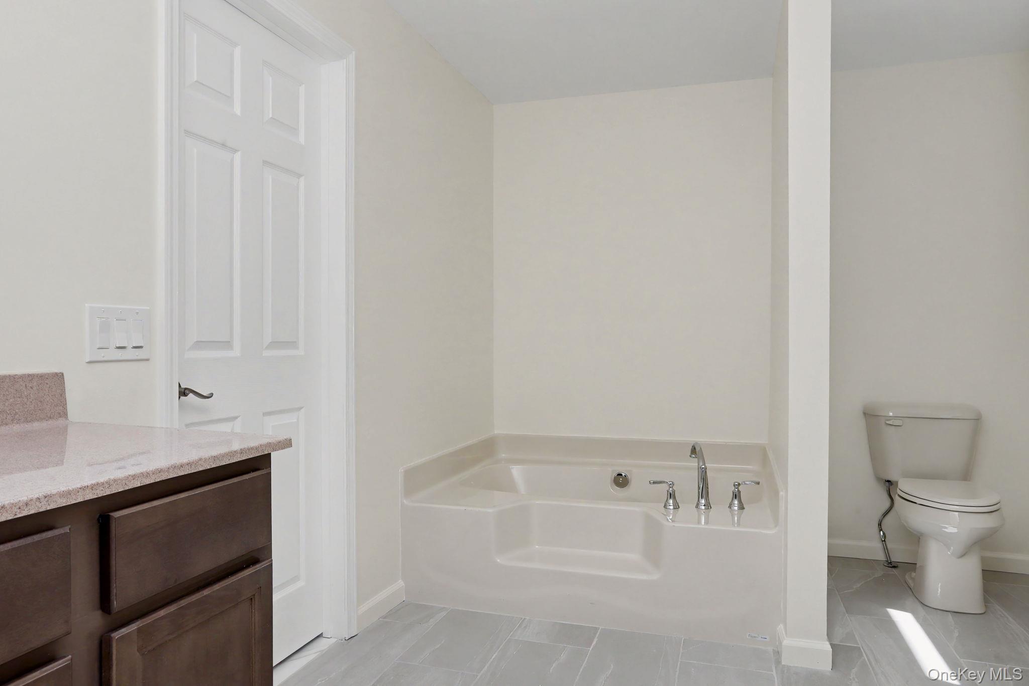 32 Spruce Road Brewster, NY 10509 - Photo 17 of 21 Primary bathroom with soaking tub