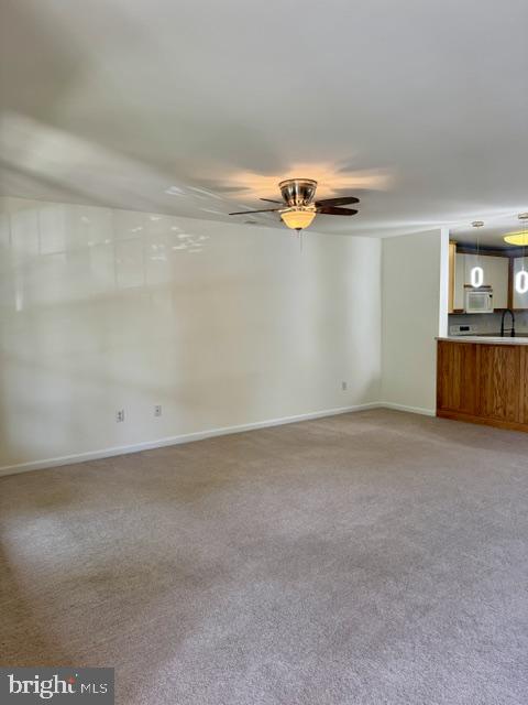 26497 Thunder Road Millsboro, DE 19966 - Photo 5 of 30 Spacious living area with natural light.