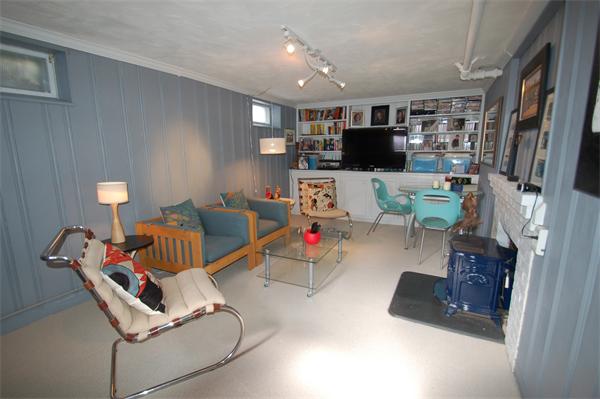 5 Garrison Road Wellesley, MA 02482 - Photo 14 of 19 a living room with furniture and a flat screen tv