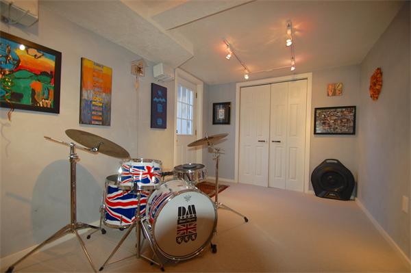 5 Garrison Road Wellesley, MA 02482 - Photo 15 of 19 a bed room with a bed and a television