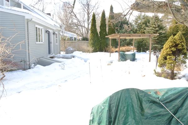 5 Garrison Road Wellesley, MA 02482 - Photo 17 of 19 a view of a house with snow on the yard