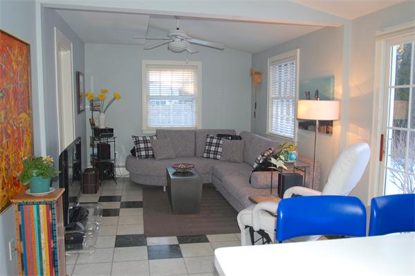 5 Garrison Road Wellesley, MA 02482 - Photo 6 of 19 a living room with furniture and a window