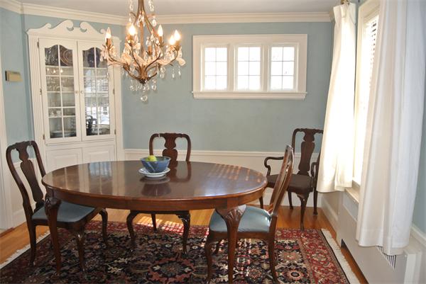 5 Garrison Road Wellesley, MA 02482 - Photo 9 of 19 a view of a dining room with furniture and chandelier