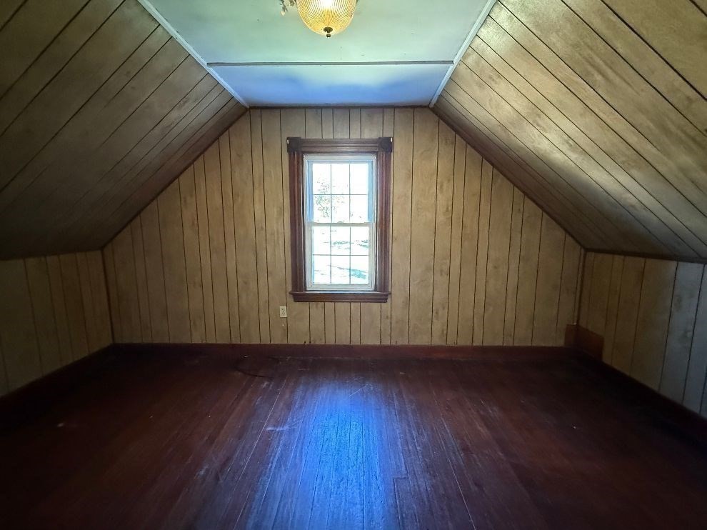 366-0 Pike Avenue Attleboro, MA 02703 - Photo 15 of 27 a view of an empty room with wooden floor and a window