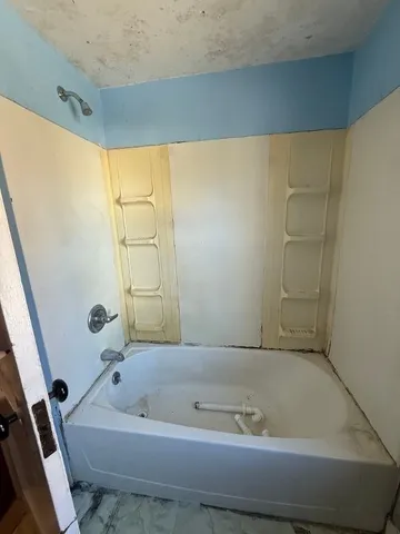 a bathroom with a bathtub