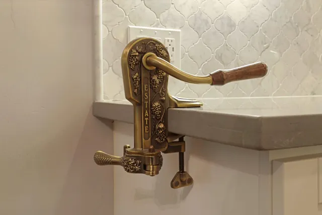 a kitchen with a stove sink and refrigerator