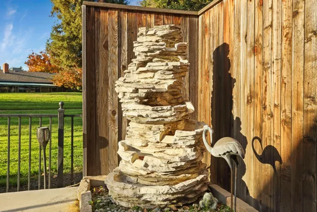 a view of a park with large trees