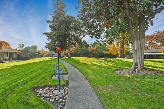 a view of a patio with a big yard