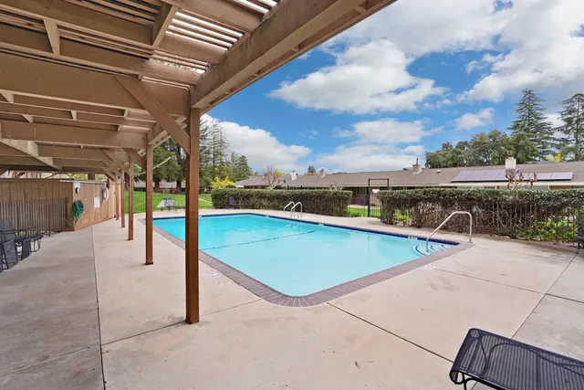 a view of a backyard with a garden