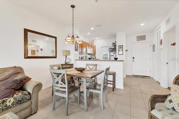 a view of a dining room with furniture