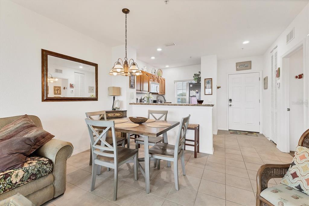 8411 Placida Road, Unit 404 Placida, FL 33946 - Photo 16 of 54 a view of a dining room with furniture