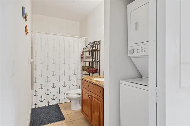 a view of a balcony with a table and chairs