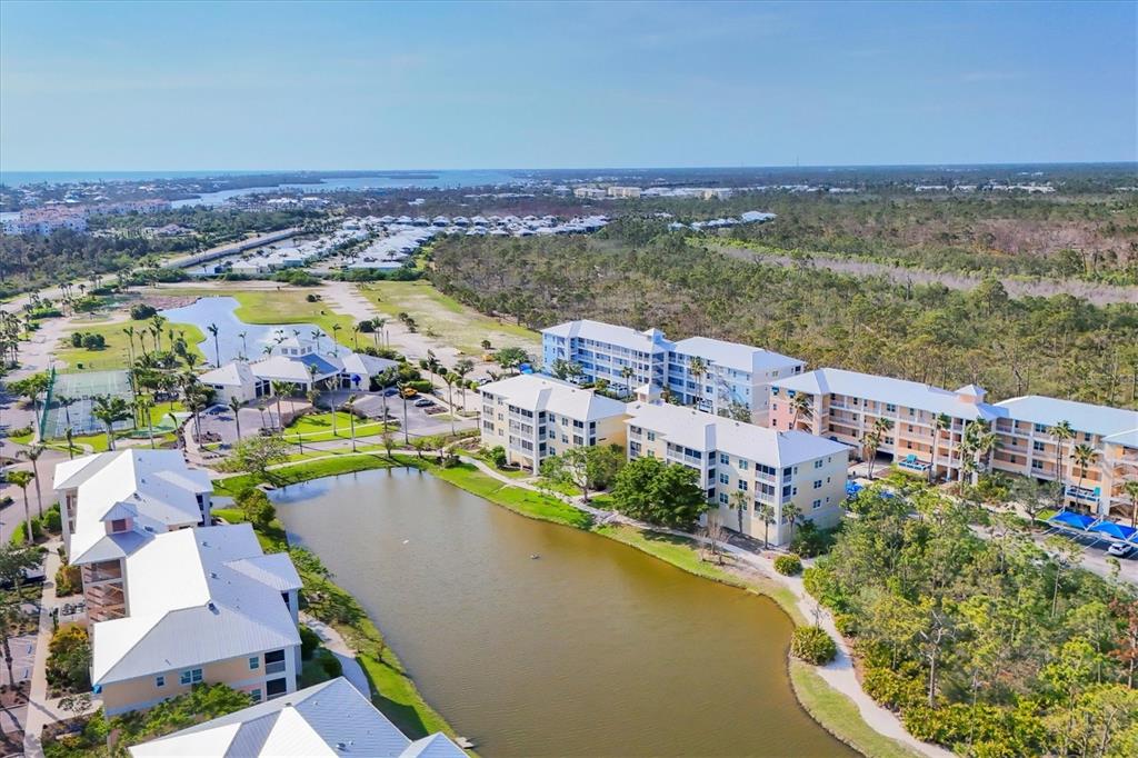 8411 Placida Road, Unit 404 Placida, FL 33946 - Photo 37 of 54 a view of a city and an ocean