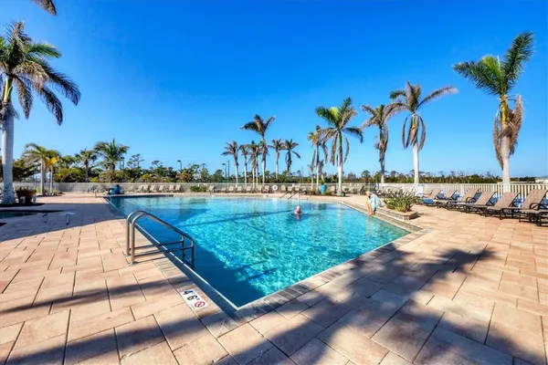 a view of a dining room with furniture and window