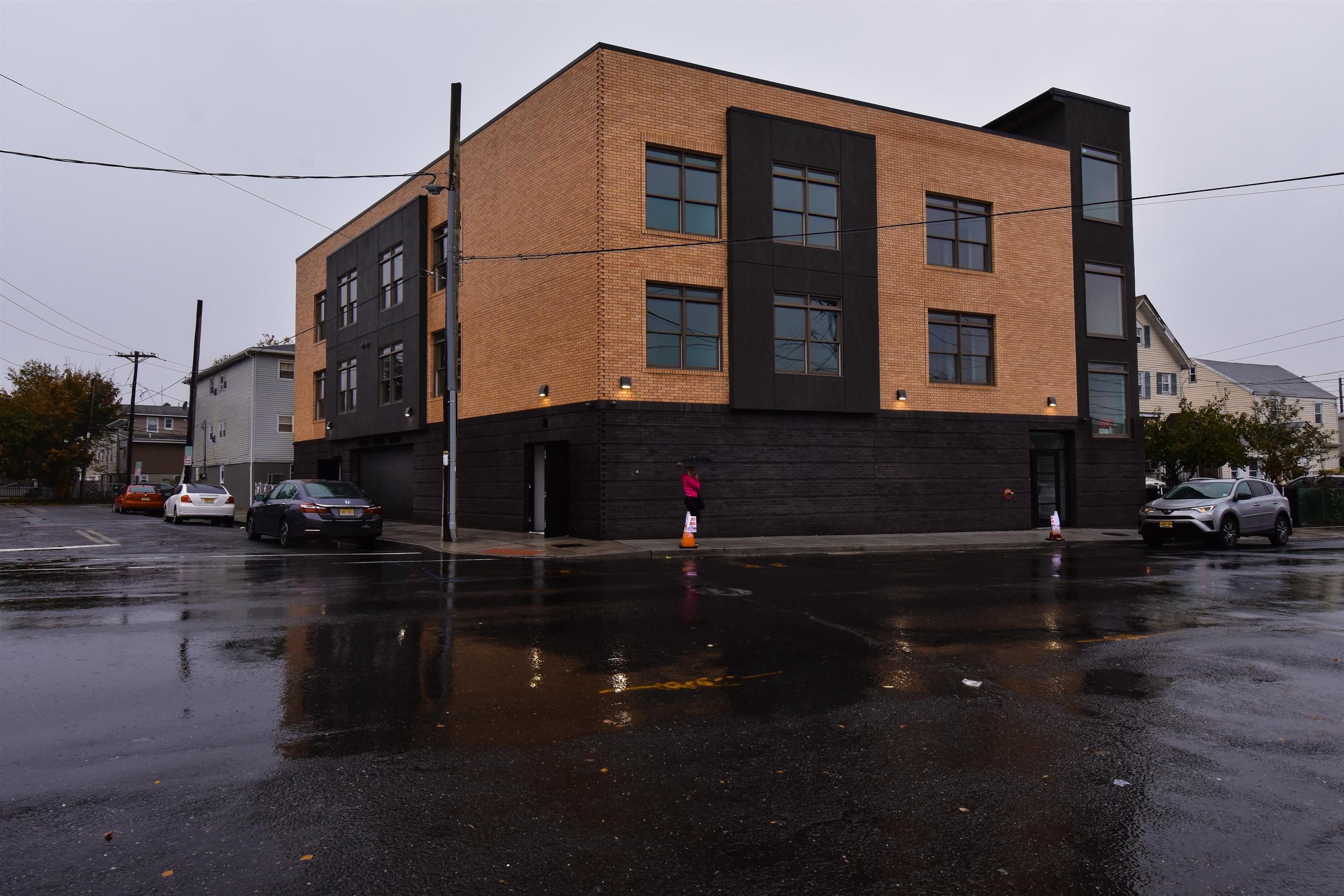 4201 Bergen Turnpike, Unit 2D North Bergen, NJ 07047 - Photo 11 of 12 a front view of a building with street