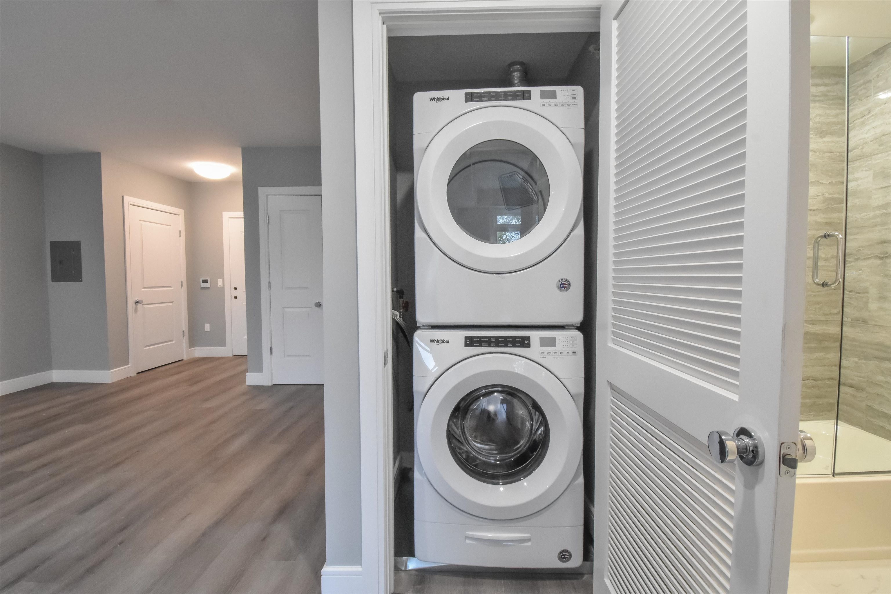 4201 Bergen Turnpike, Unit 2D North Bergen, NJ 07047 - Photo 10 of 12 a view of a hallway with washer and dryer