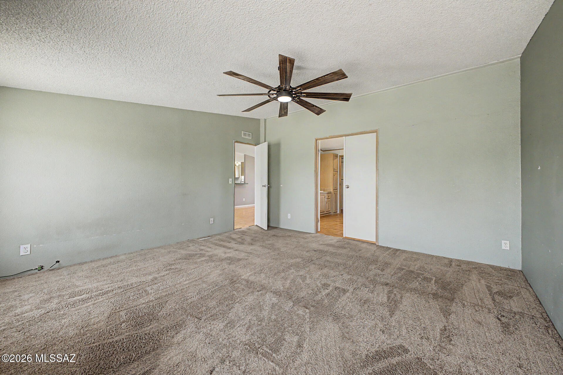 1911 West Thunder Road Vail, AZ 85641 - Photo 16 of 38 a view of a big room with carpet