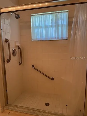 a view of a swimming pool with an outdoor space and seating area