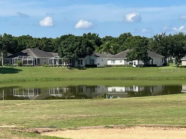 a view of a house with a swimming pool