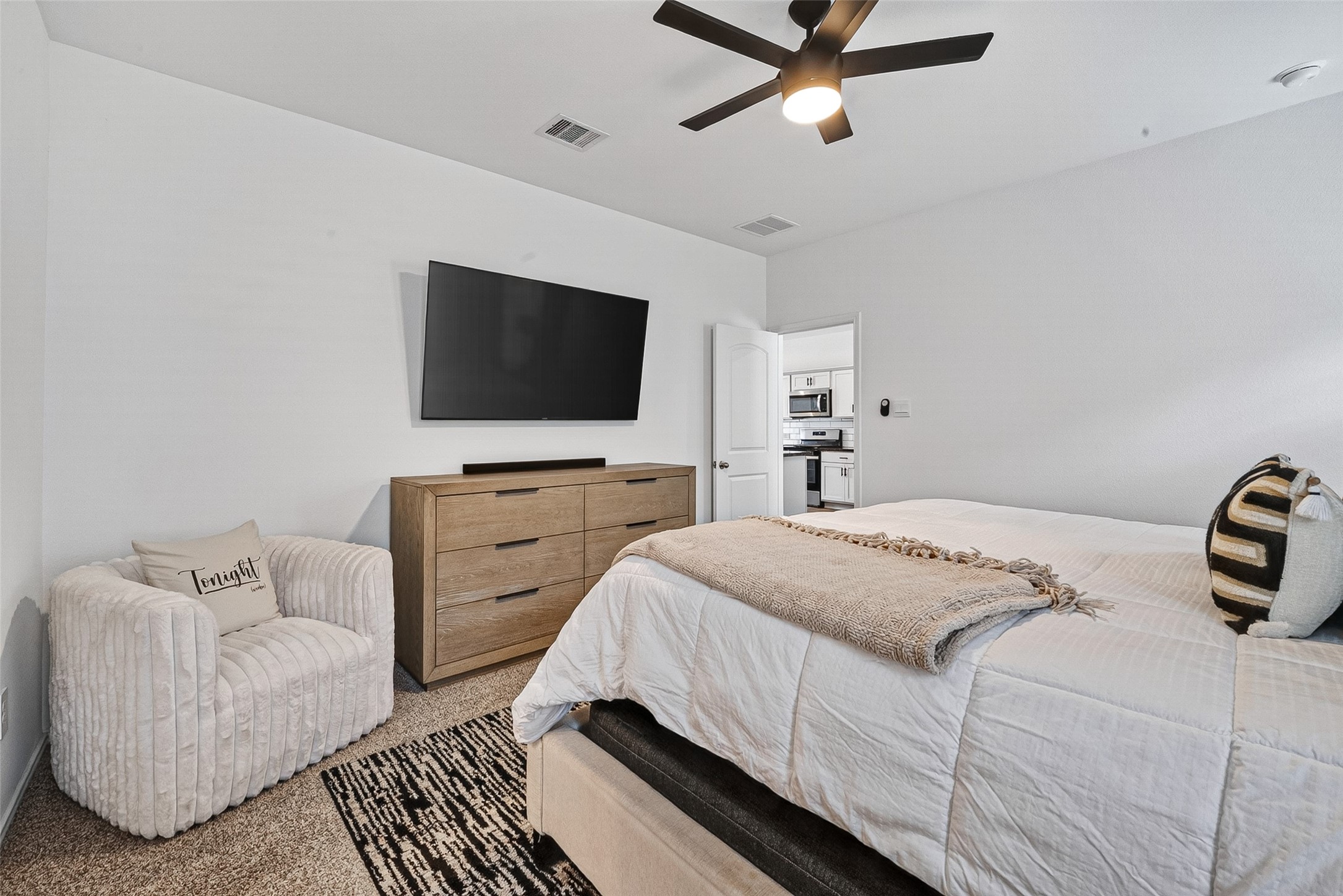 24318 Pebble Crescent Ln Spring Spring, TX 77373 - Photo 20 of 30 Gorgeous and spacious primary suite offering a peaceful retreat with abundant natural light, elegant finishes, and plenty of room to relax and unwind after a long day.