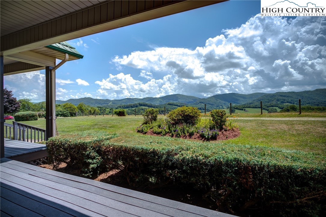 356 Irwin Farm Lane Sparta, NC 28675 - Photo 24 of 50 a view of a garden with an outdoor seating
