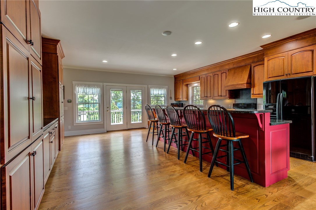 356 Irwin Farm Lane Sparta, NC 28675 - Photo 34 of 50 a view of dining room with furniture window and wooden floor