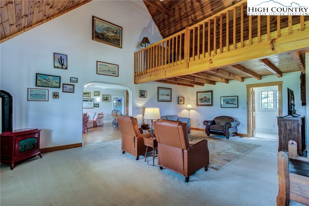 356 Irwin Farm Lane Sparta, NC 28675 - Photo 44 of 50 a living room with furniture