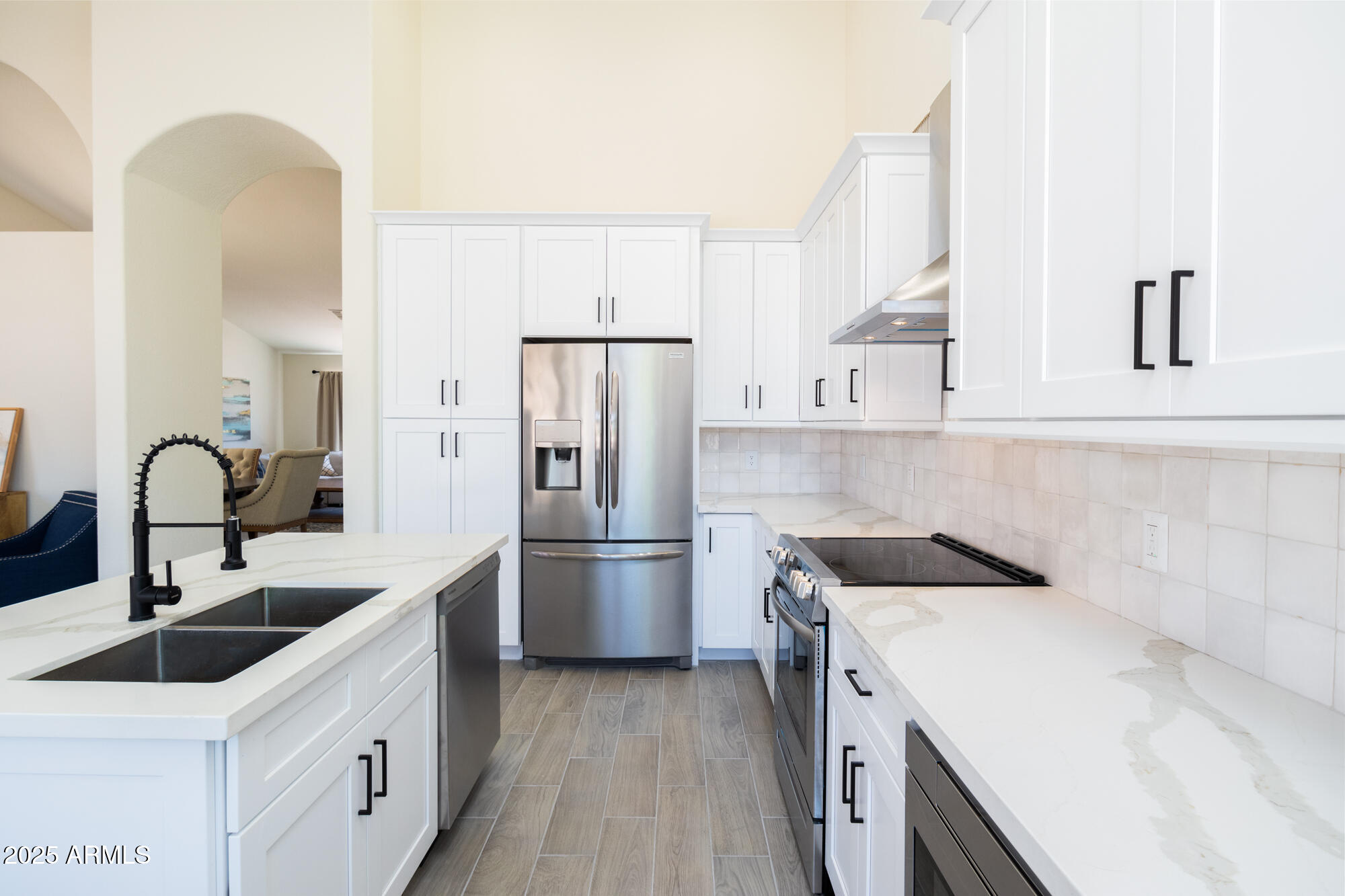 850 North Los Altos Drive Chandler, AZ 85224 - Photo 13 of 34 a kitchen with stainless steel appliances a sink and a refrigerator