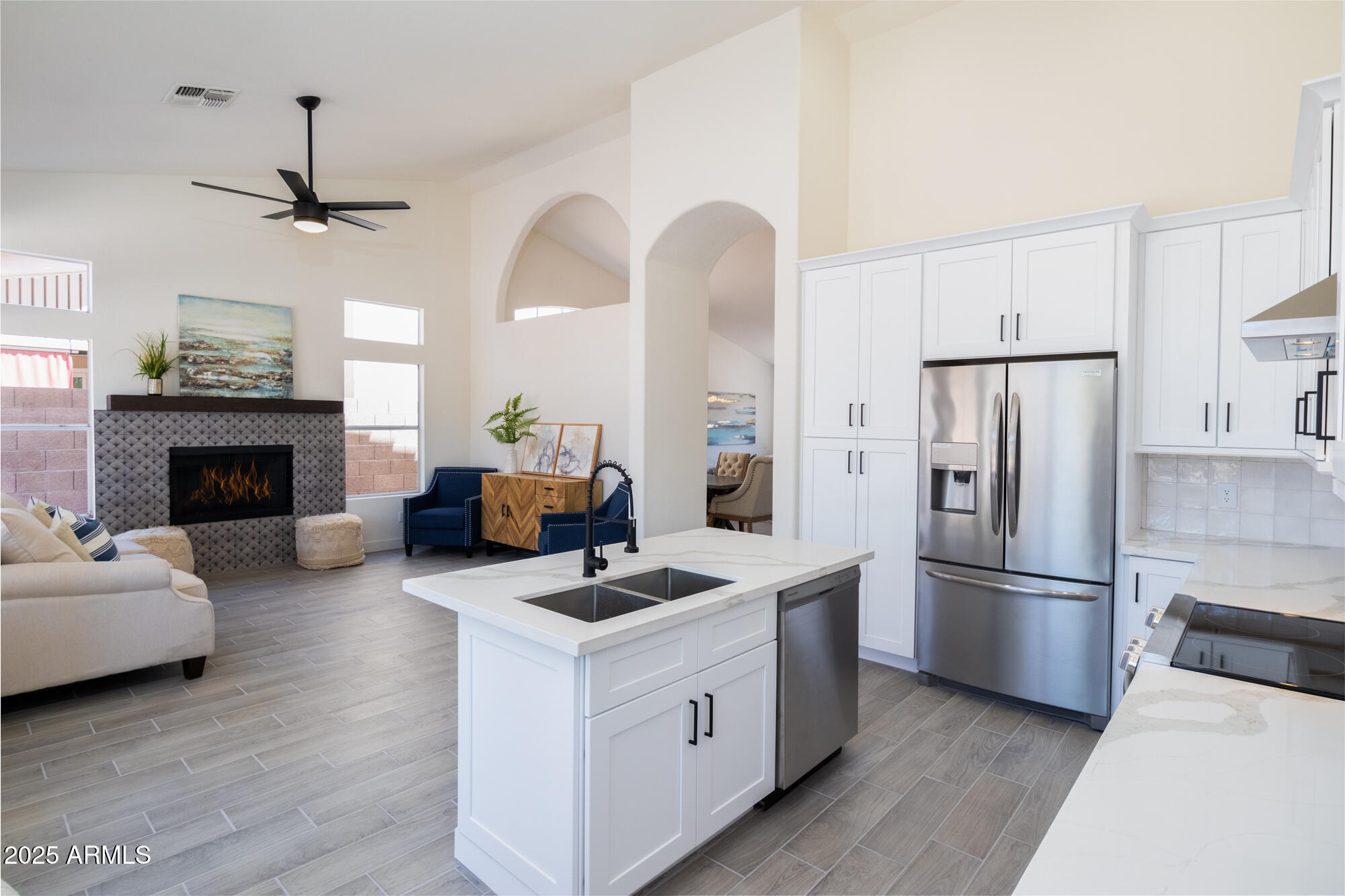 850 North Los Altos Drive Chandler, AZ 85224 - Photo 15 of 34 a kitchen with furniture a refrigerator and a fireplace