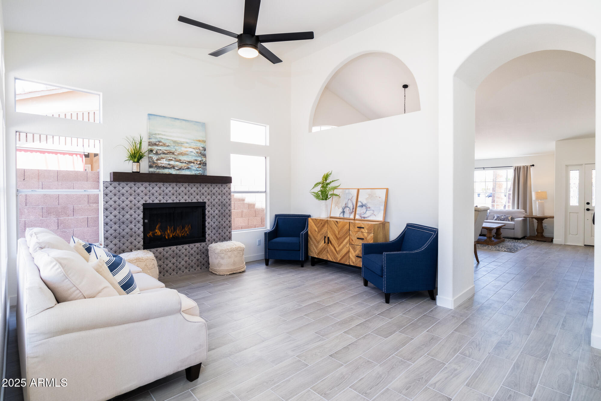 850 North Los Altos Drive Chandler, AZ 85224 - Photo 16 of 34 a living room with furniture and a fireplace