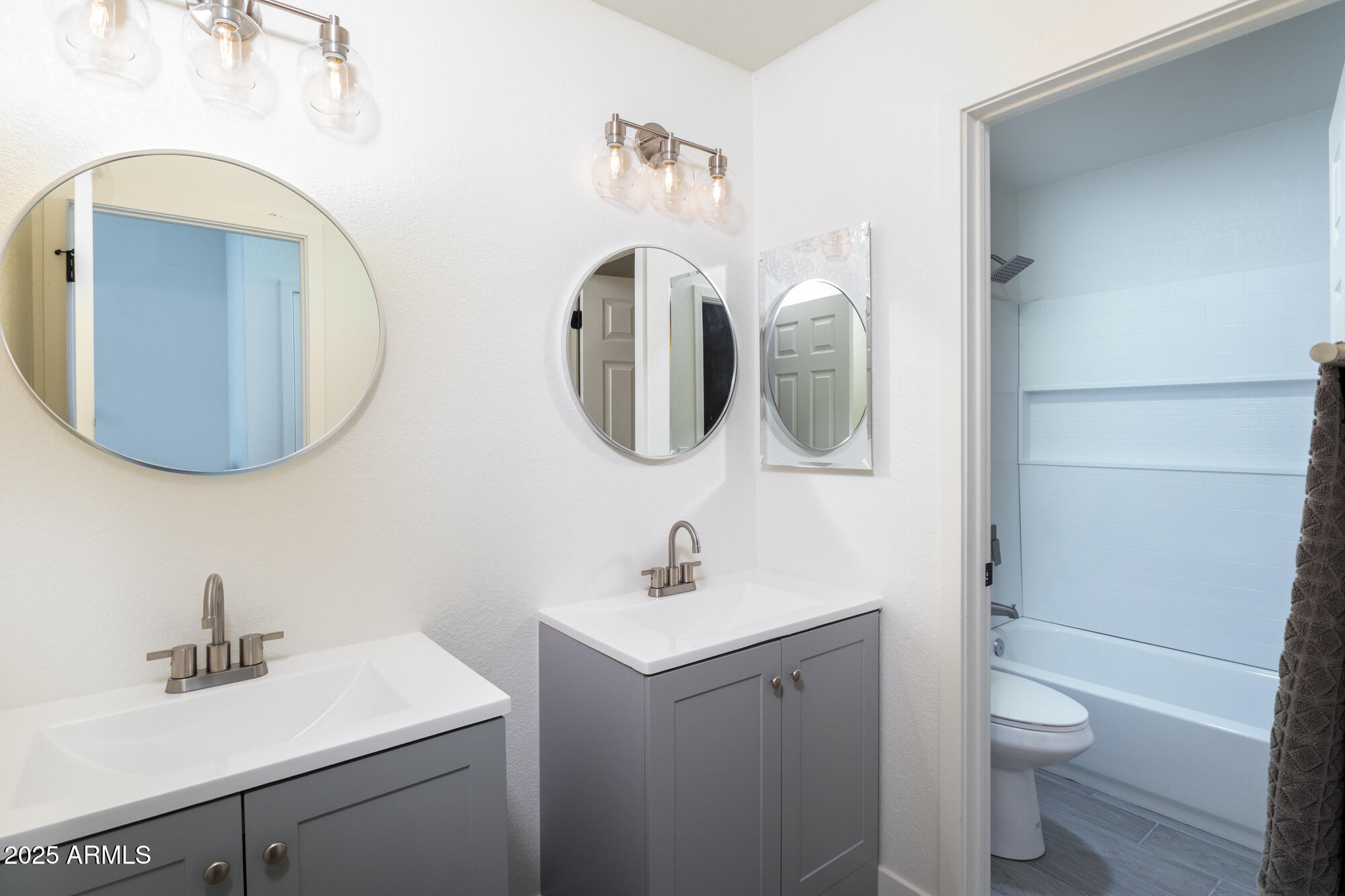 850 North Los Altos Drive Chandler, AZ 85224 - Photo 25 of 34 a bathroom with a toilet sink and mirror