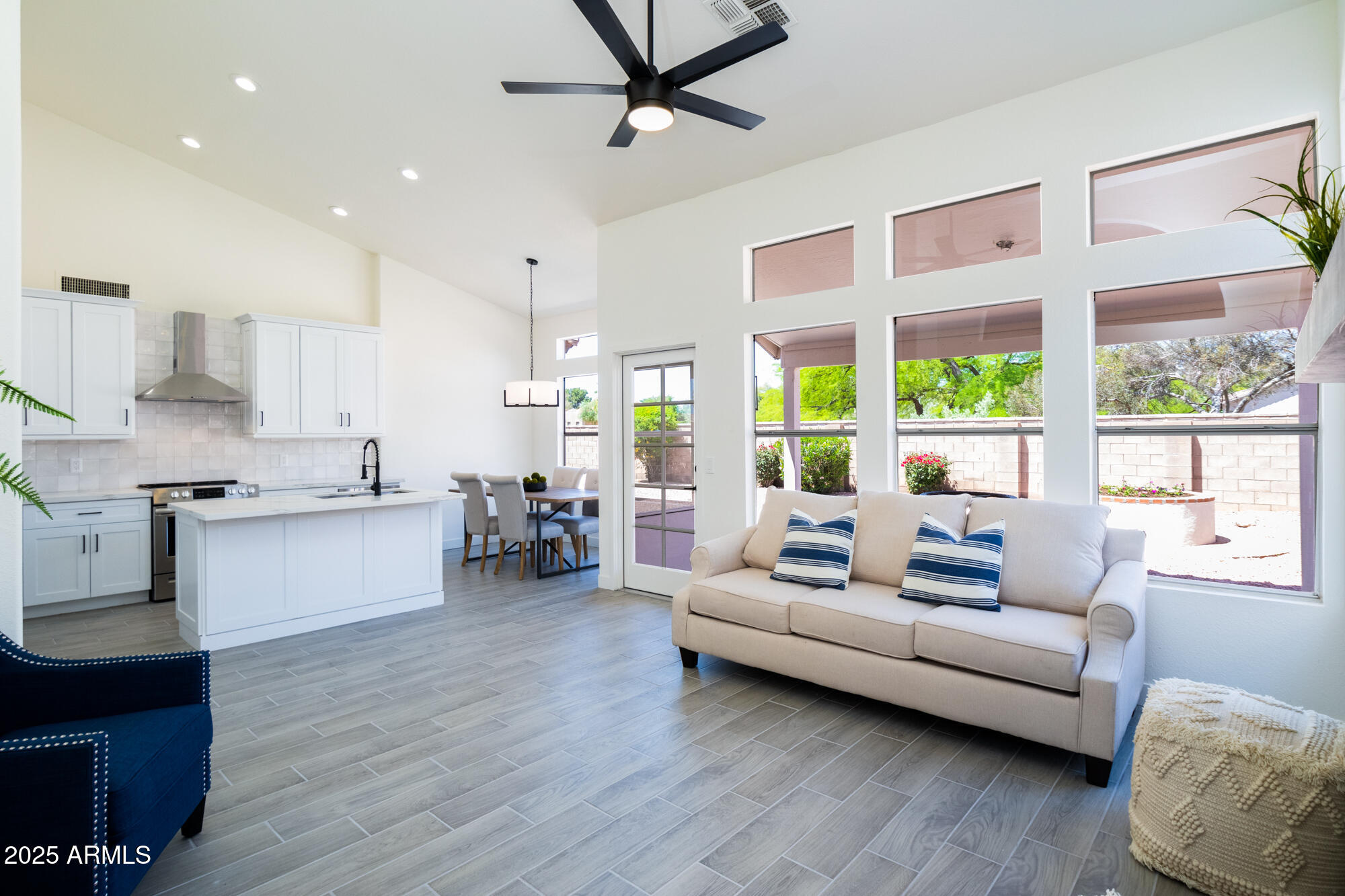 850 North Los Altos Drive Chandler, AZ 85224 - Photo 7 of 34 a living room with furniture and large windows
