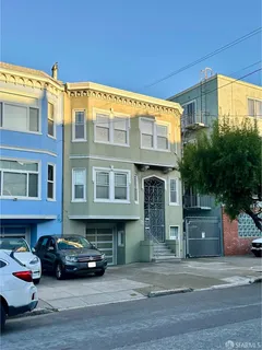 a car parked in front of a building