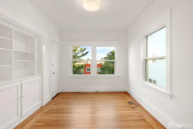 an empty room with window