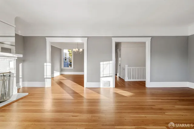 a view of a livingroom with wooden floor