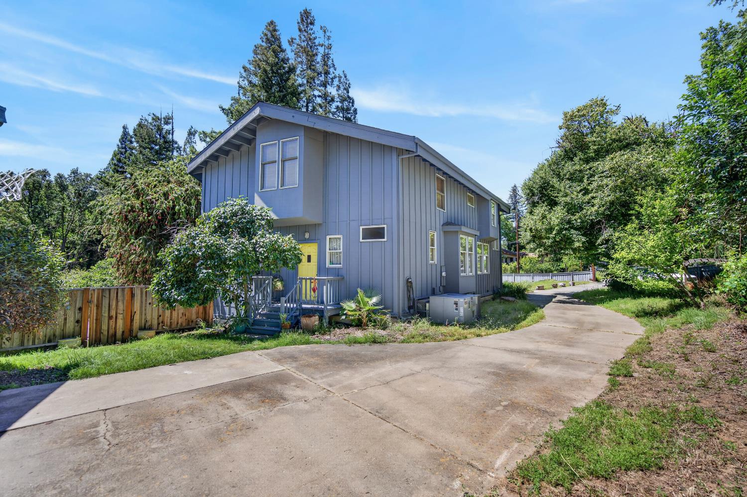 3940 Bannister Road Fair Oaks, CA 95628 - Photo 75 of 84 a front view of a house with a yard and a garage