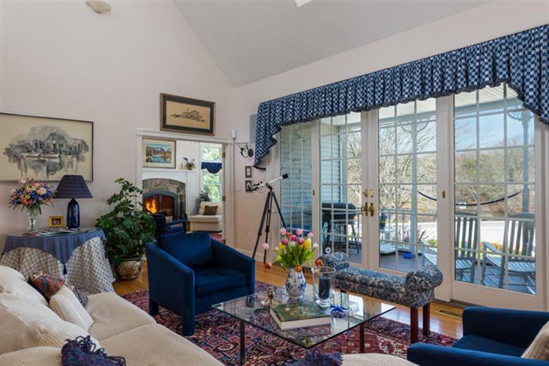 113 James Circle Mashpee, MA 02649 - Photo 4 of 21 a living room with furniture and a large window