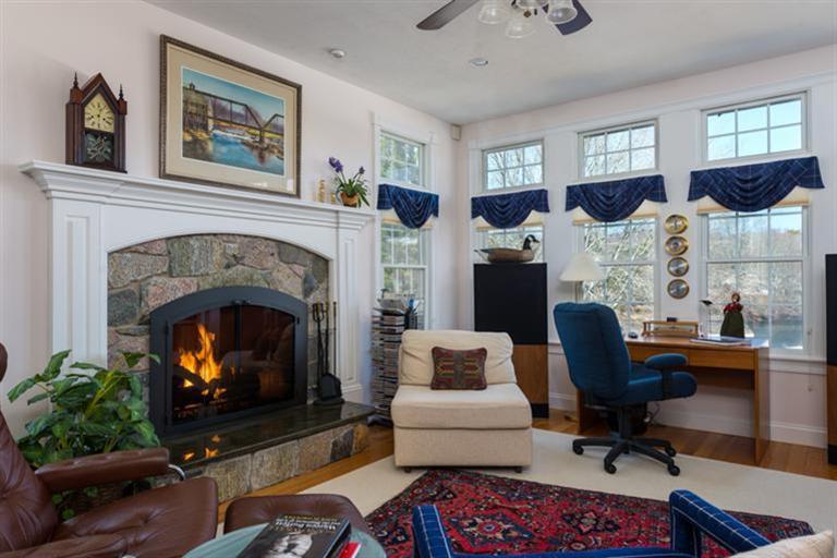 113 James Circle Mashpee, MA 02649 - Photo 6 of 21 a living room with furniture and a fireplace
