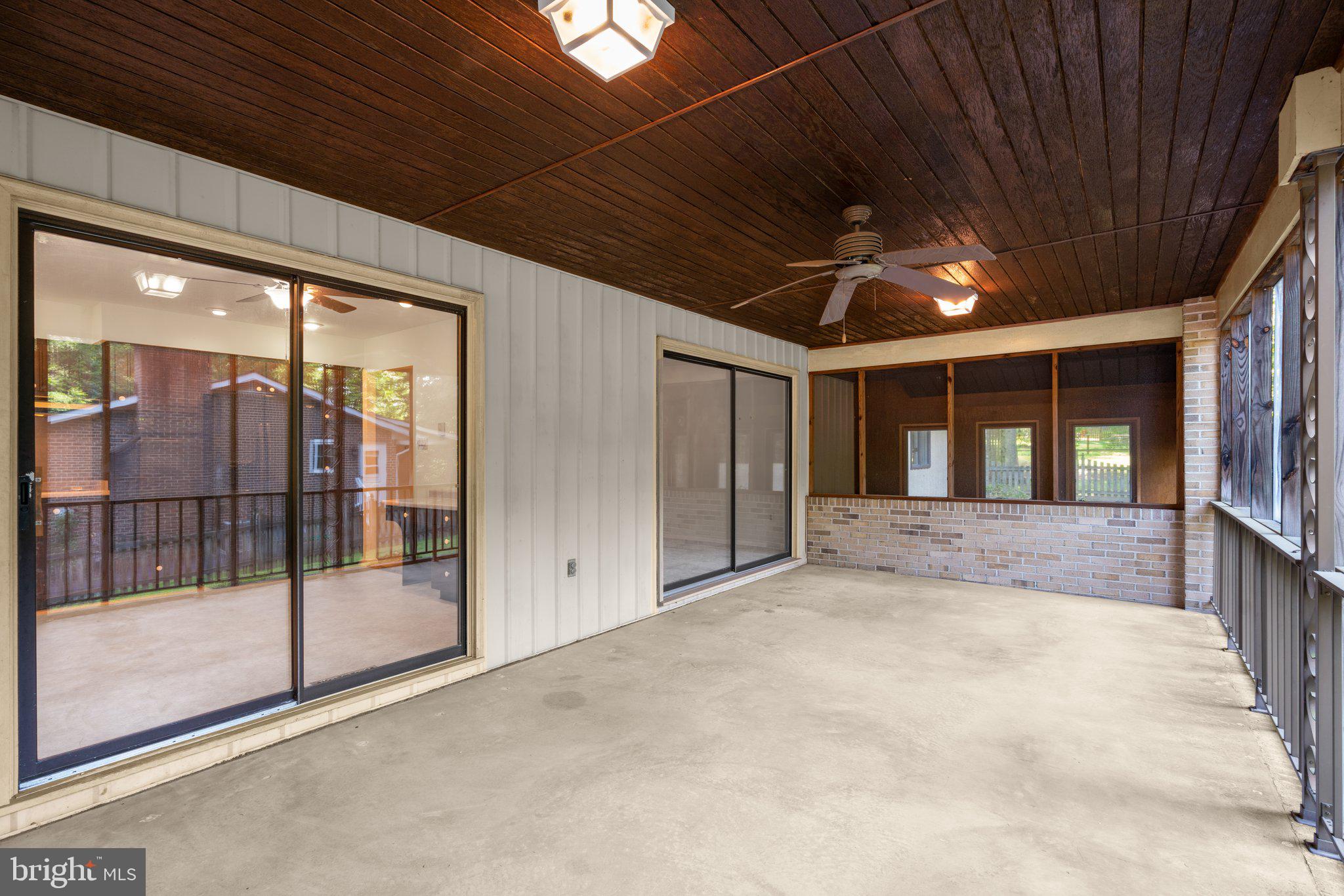 600 Deep Ridge Road Bel Air, MD 21014 - Photo 20 of 45 Two sliding glass doors lead to screen porch