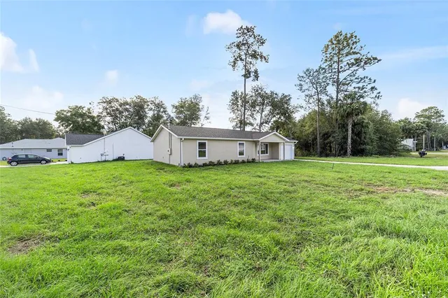 a house view with a garden space