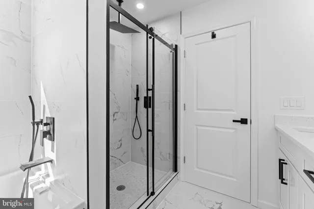 a view of a hallway with a chair