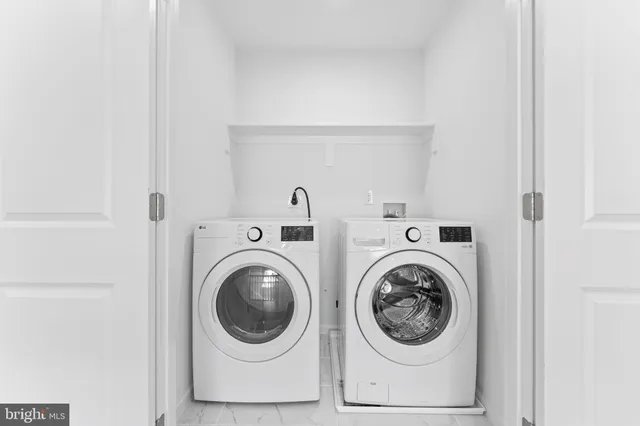 a view of entryway with a front door