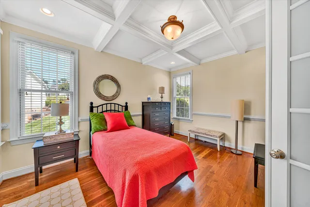 a large kitchen with cabinets stainless steel appliances and a counter top