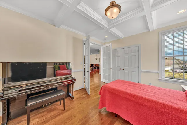 a kitchen with a sink and chandelier