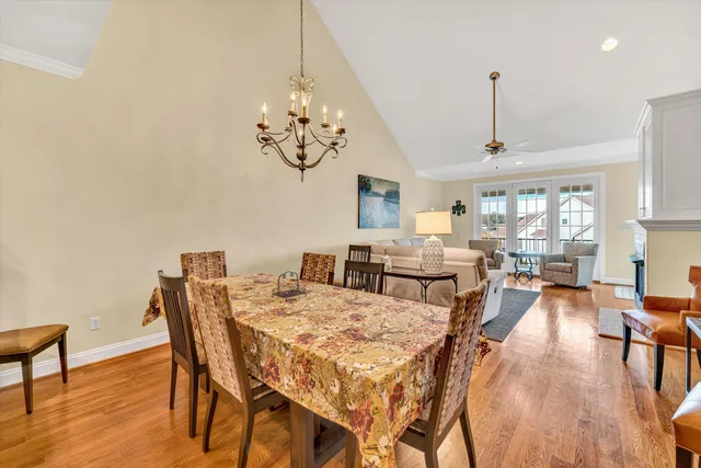 a view of a roof deck with furniture