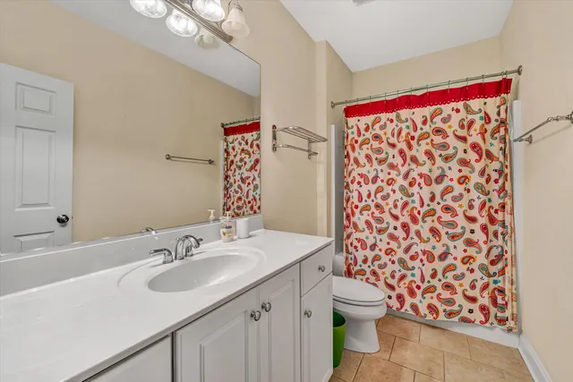 an aerial view of a house with a lake view