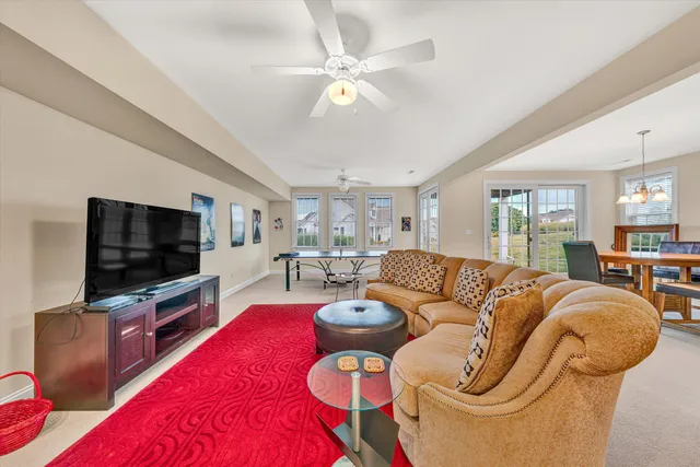 a view of a white house with a yard