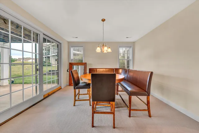 a view of swimming pool with a patio