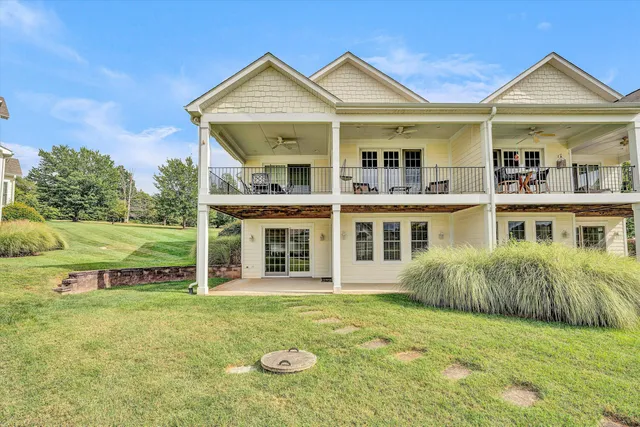 a bedroom with a bed and a table in it
