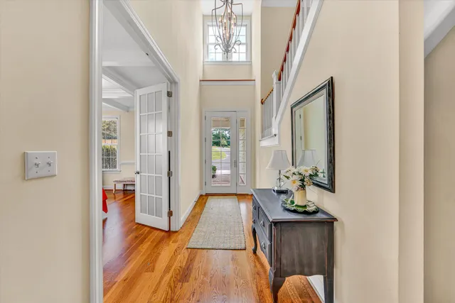 a bathroom with a sink mirror toilet and shower